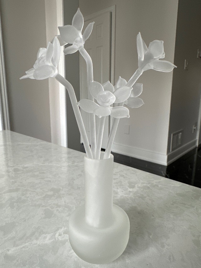 Vintage frosted glass vase with flowers