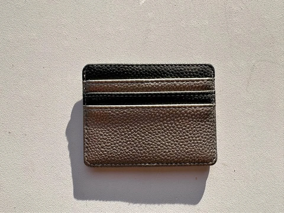Two-tone black and silver card holder