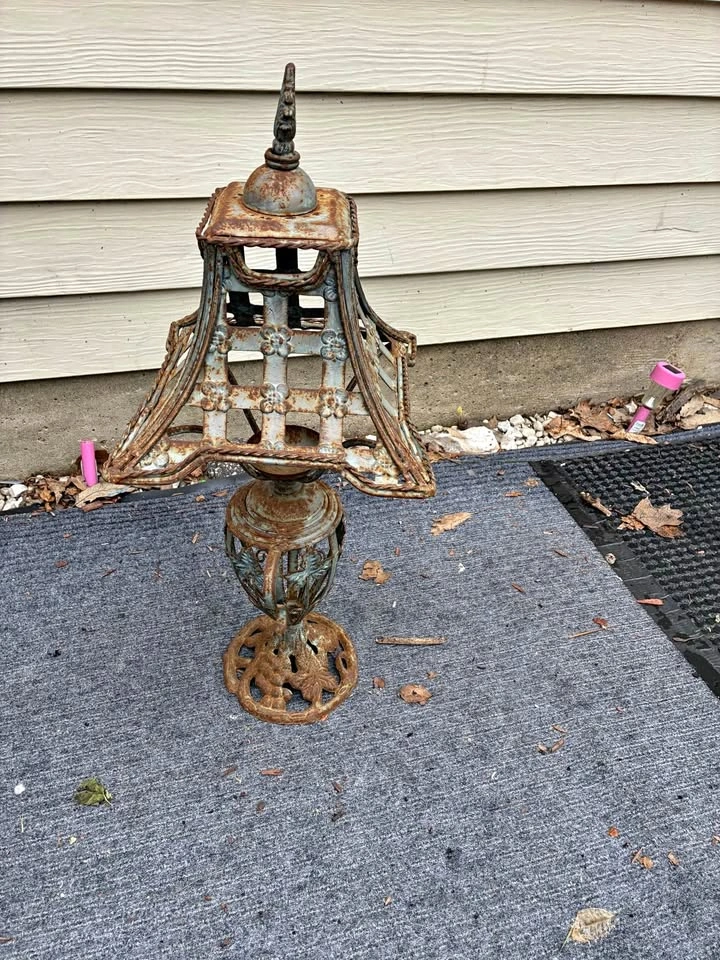 Rustic vintage cast iron lantern for outdoor