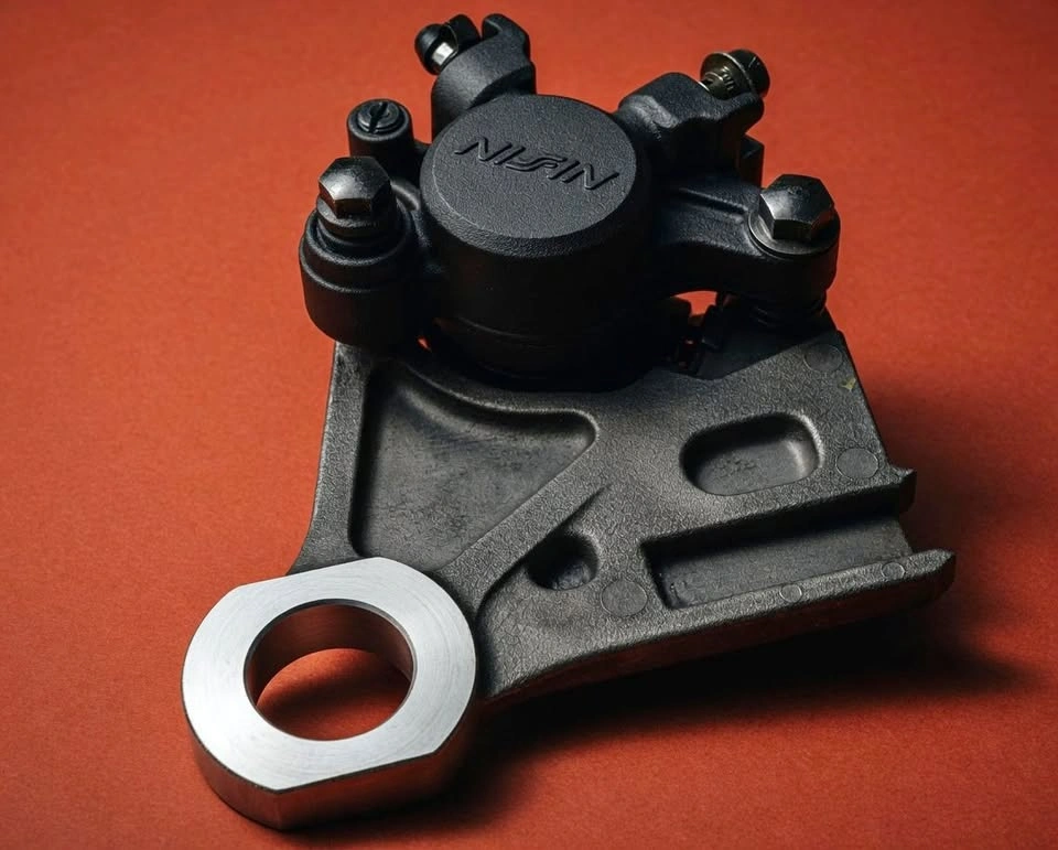 Motorcycle Rear Brake Caliper by Nissin - Single Piston