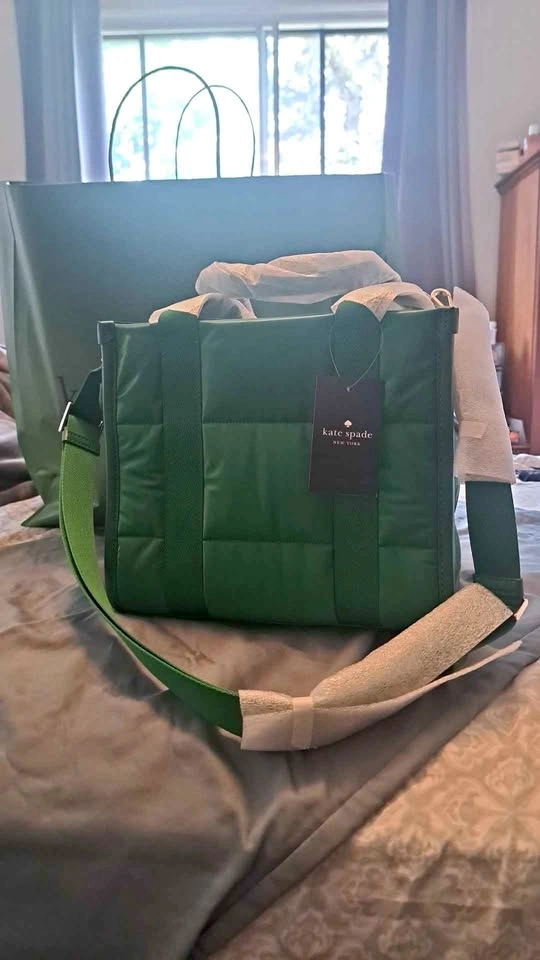 Kate Spade cross body purse with handles. Brand new
