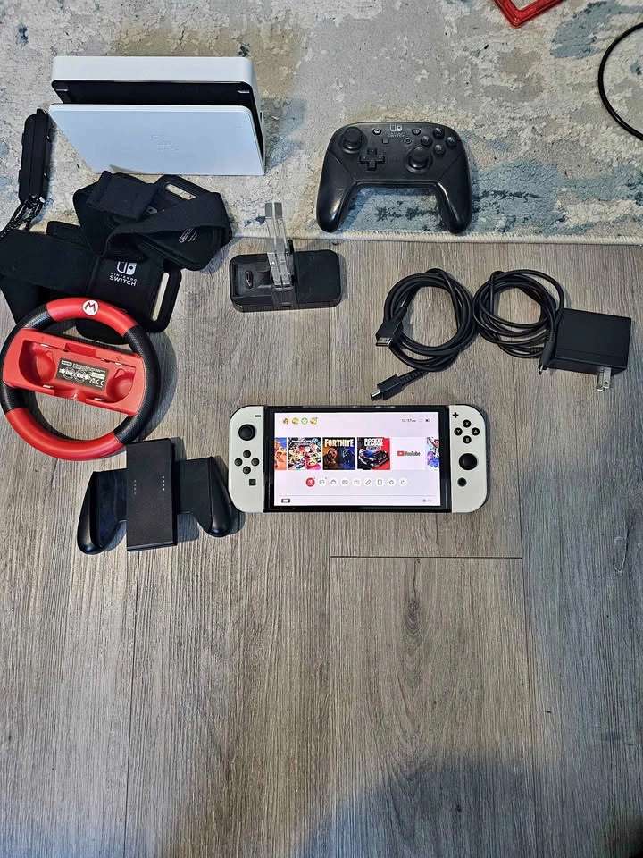 Nintendo switch OLED for sale with extra controller $280