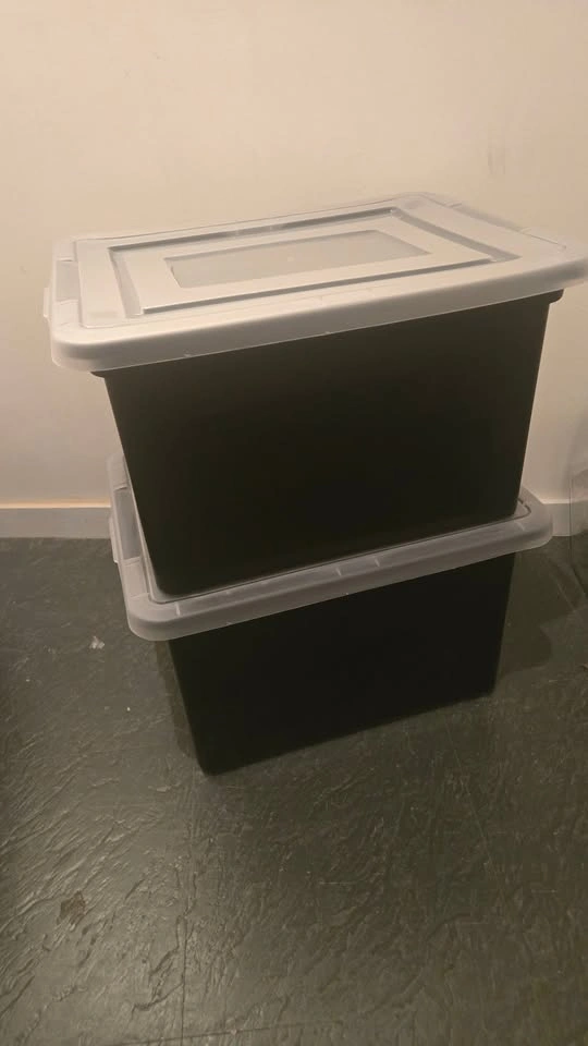 two black plastic bins with clear lids - photo 2