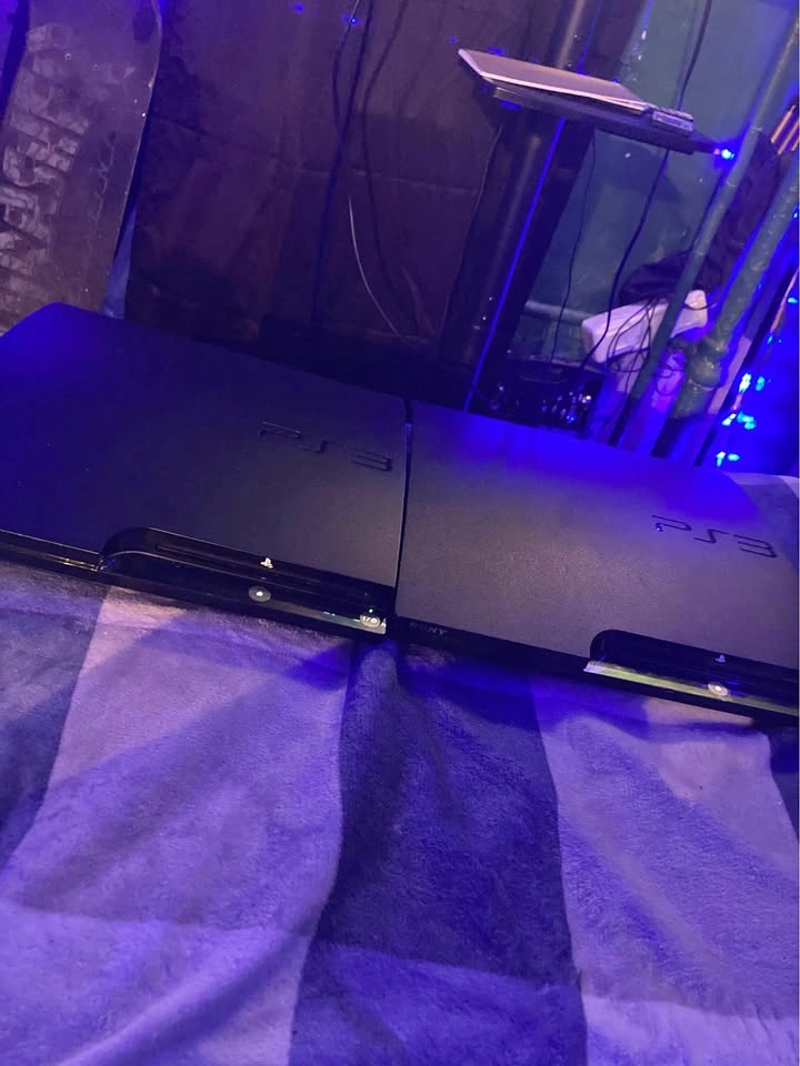 Two Sony PlayStation 3 Slims