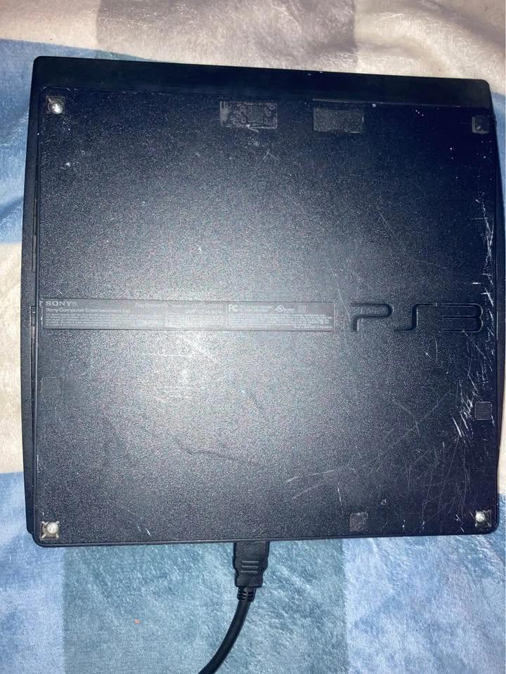 Sony PlayStation 3 Slim - photo 2