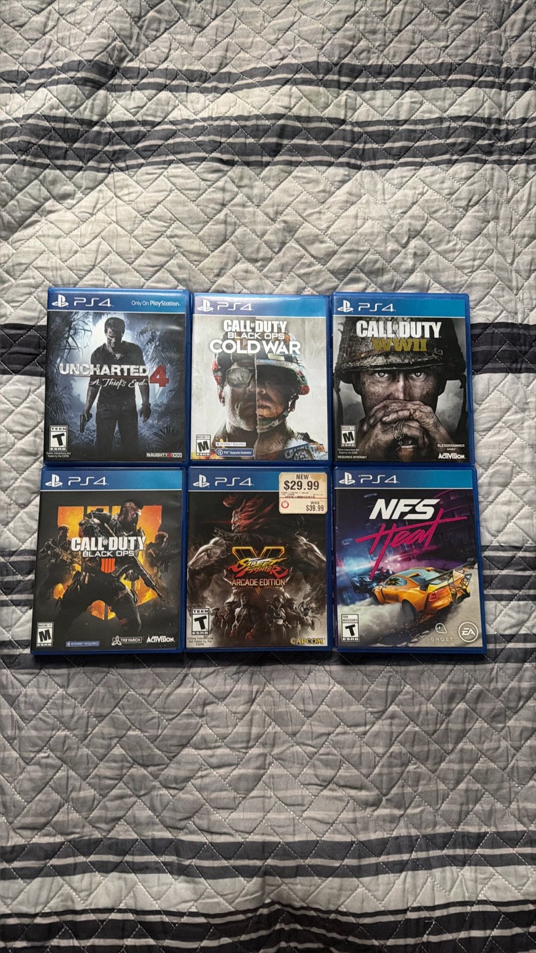 PS4 Game Bundle - 6 Games (COD, NFS, Street Fighter, Uncharted)