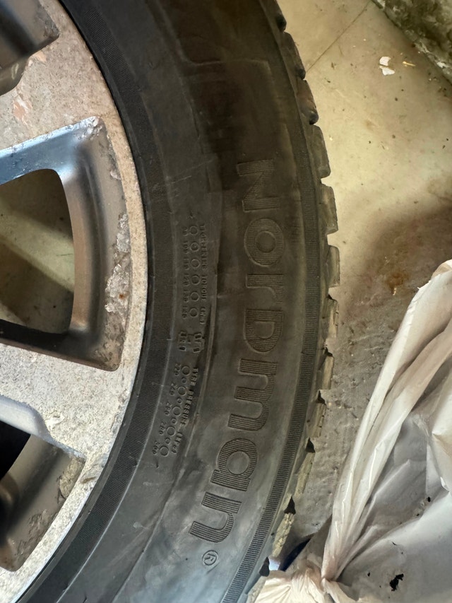 4 Nordman North 9 SUV Tires with Nissan Rims
