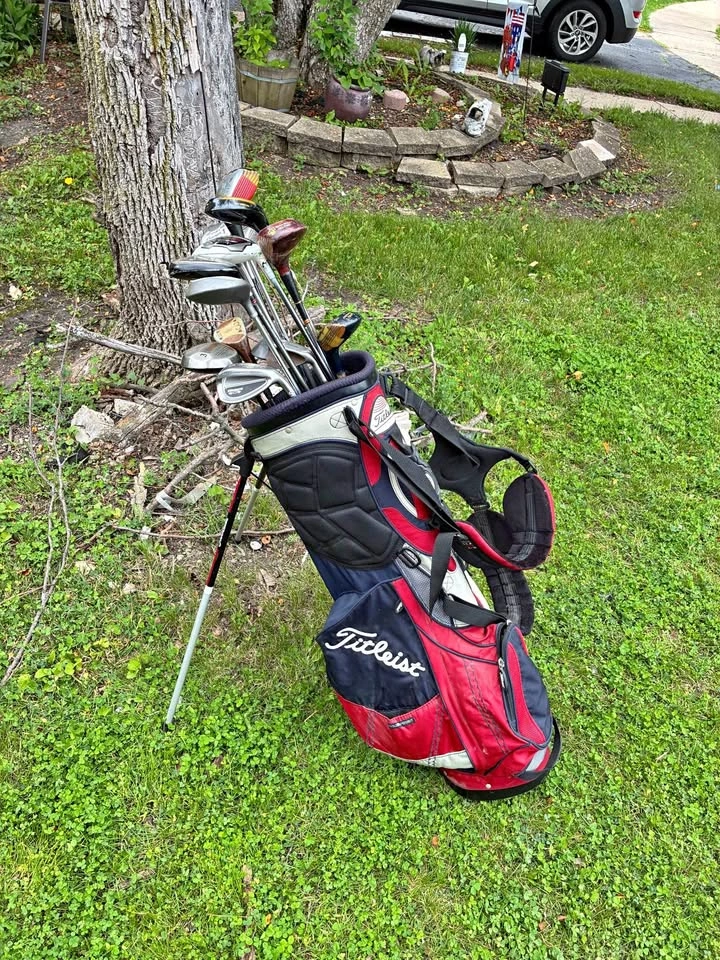 Titleist standing golf bag with clubs