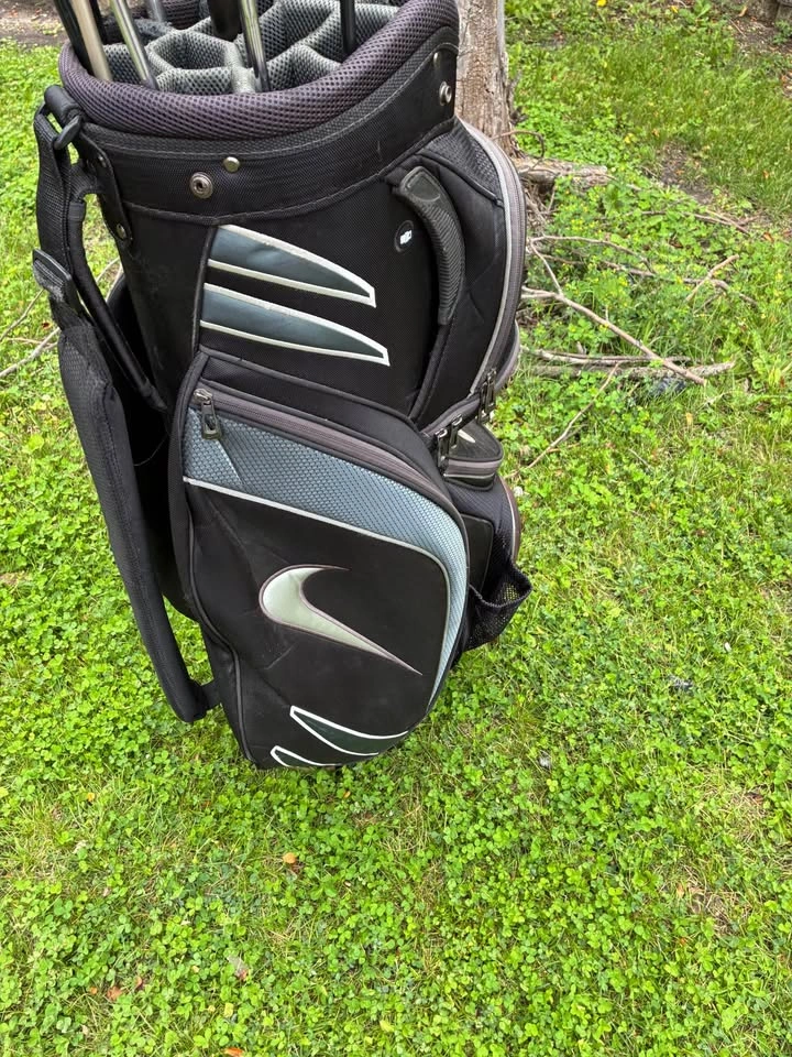 Nike golf bag with various golf clubs - photo 2