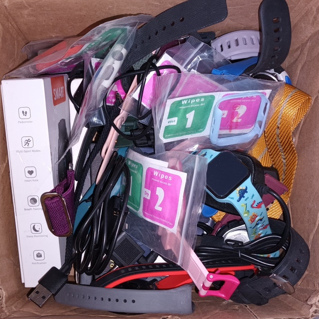 Box of NEW Misc Watch Parts - Straps, Charging Cords Etc Variety