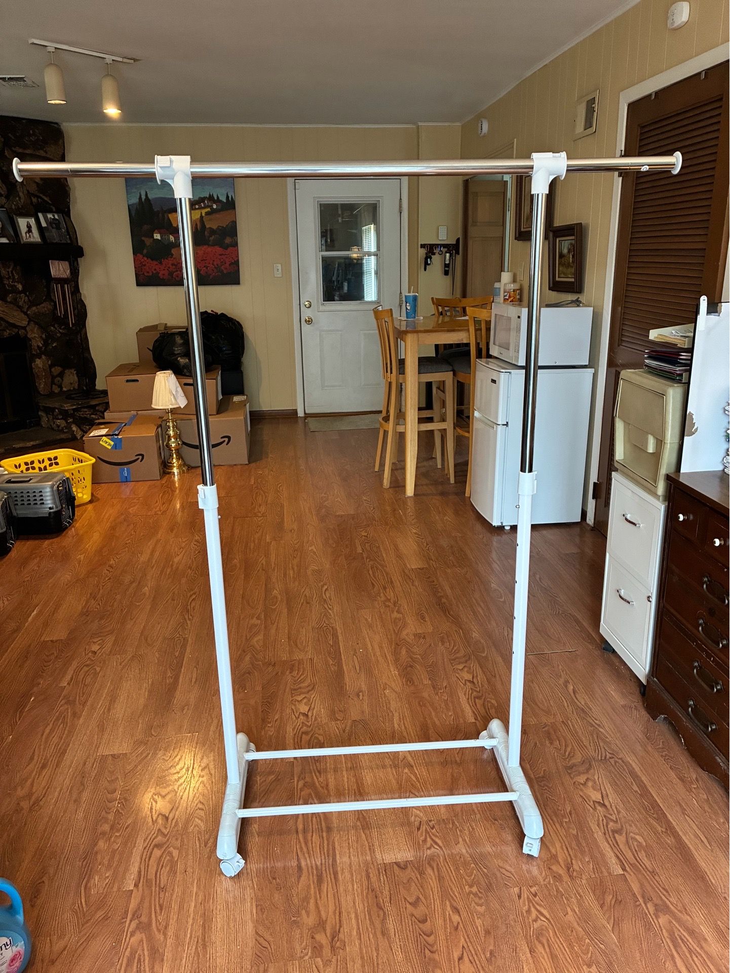 White Clothes Hanging Rack Expandable on Wheels
