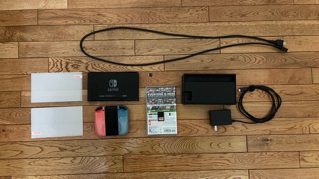 Nintendo Switch with Games and Accessories - photo 2