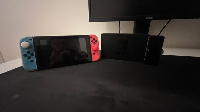 Nintendo Switch with Games and Accessories - photo 3