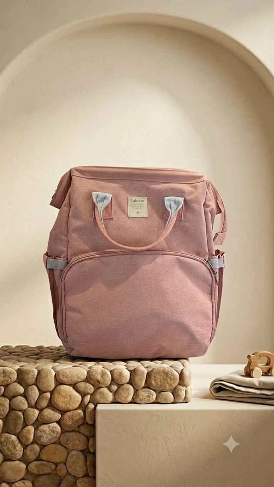 Travel Diaper Bag that turns into a bed