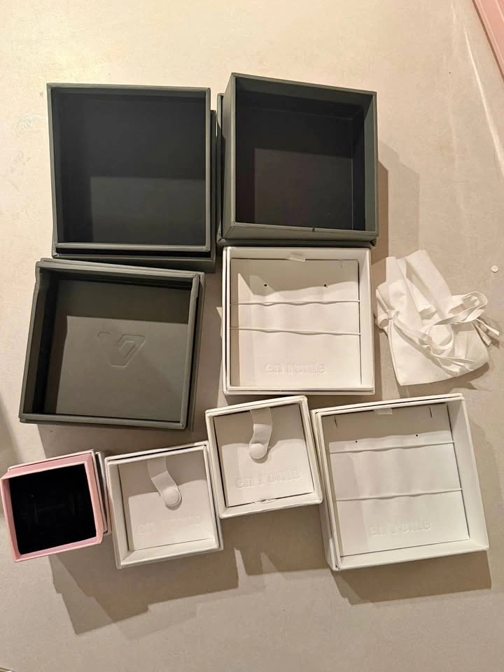 Assorted jewelry open boxes