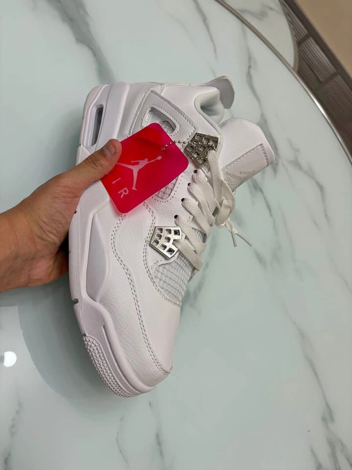 Jordan 4s Pure Moneys
