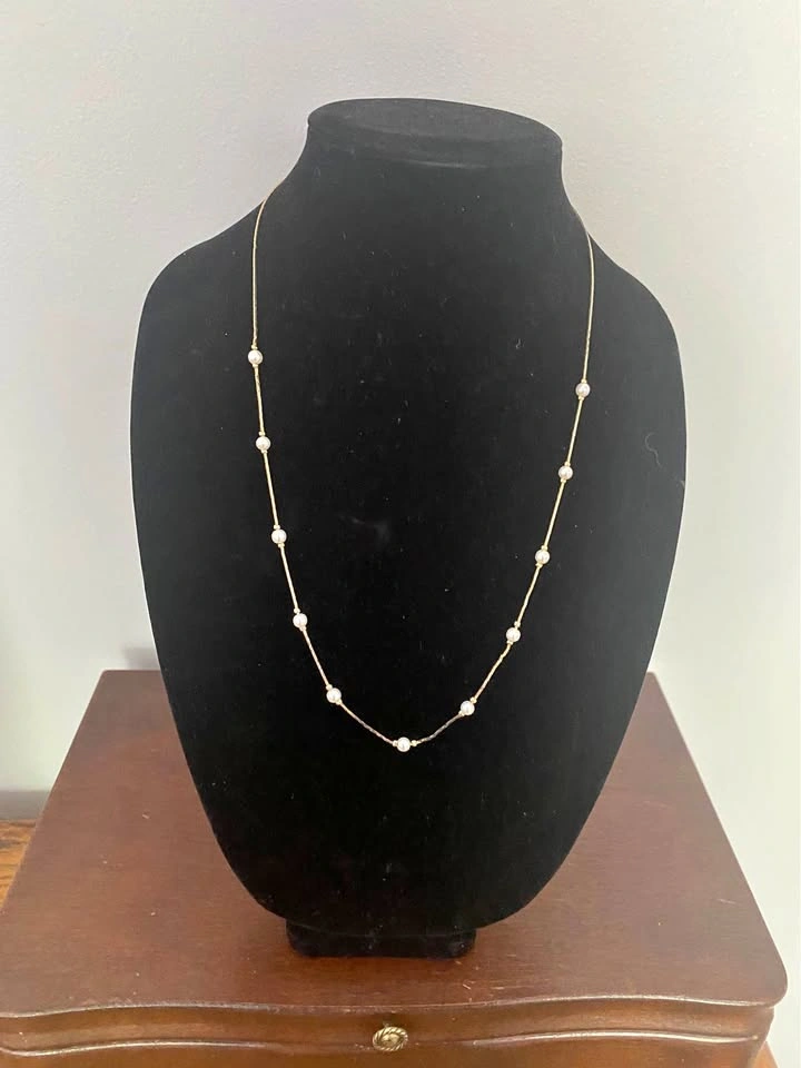 Vintage to the 1980s Gold-Toned Pearl Station Necklace