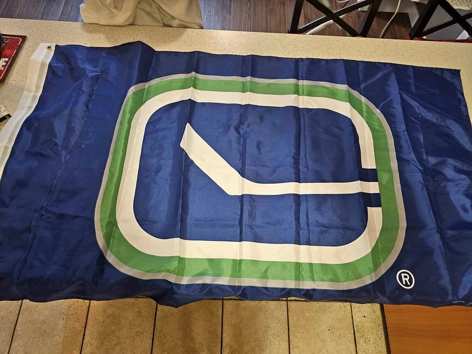 Vancouver Canucks Stick-in-Rink Flag