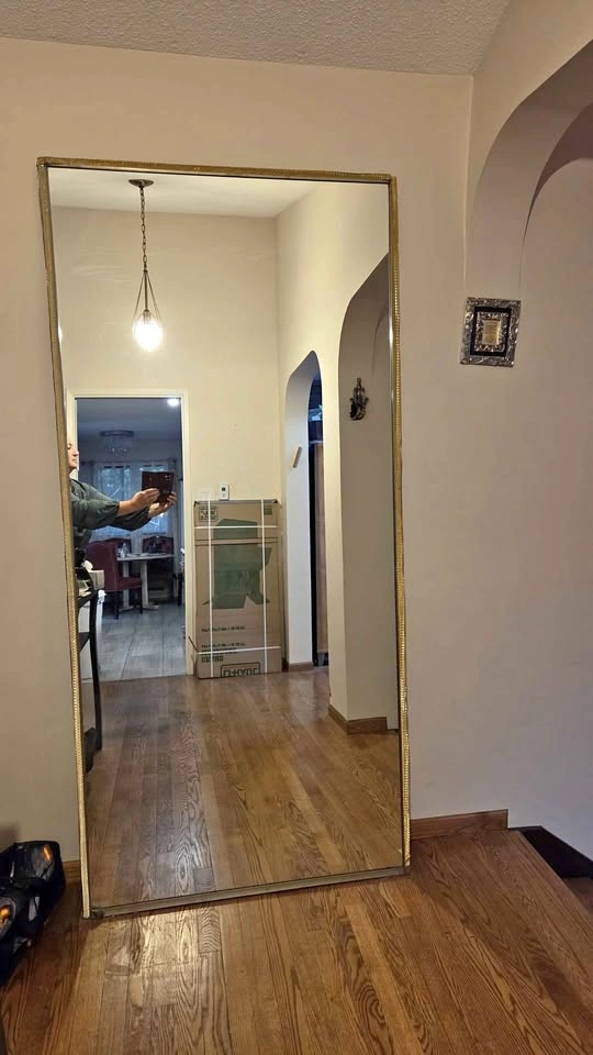 Large mirror with gold trim