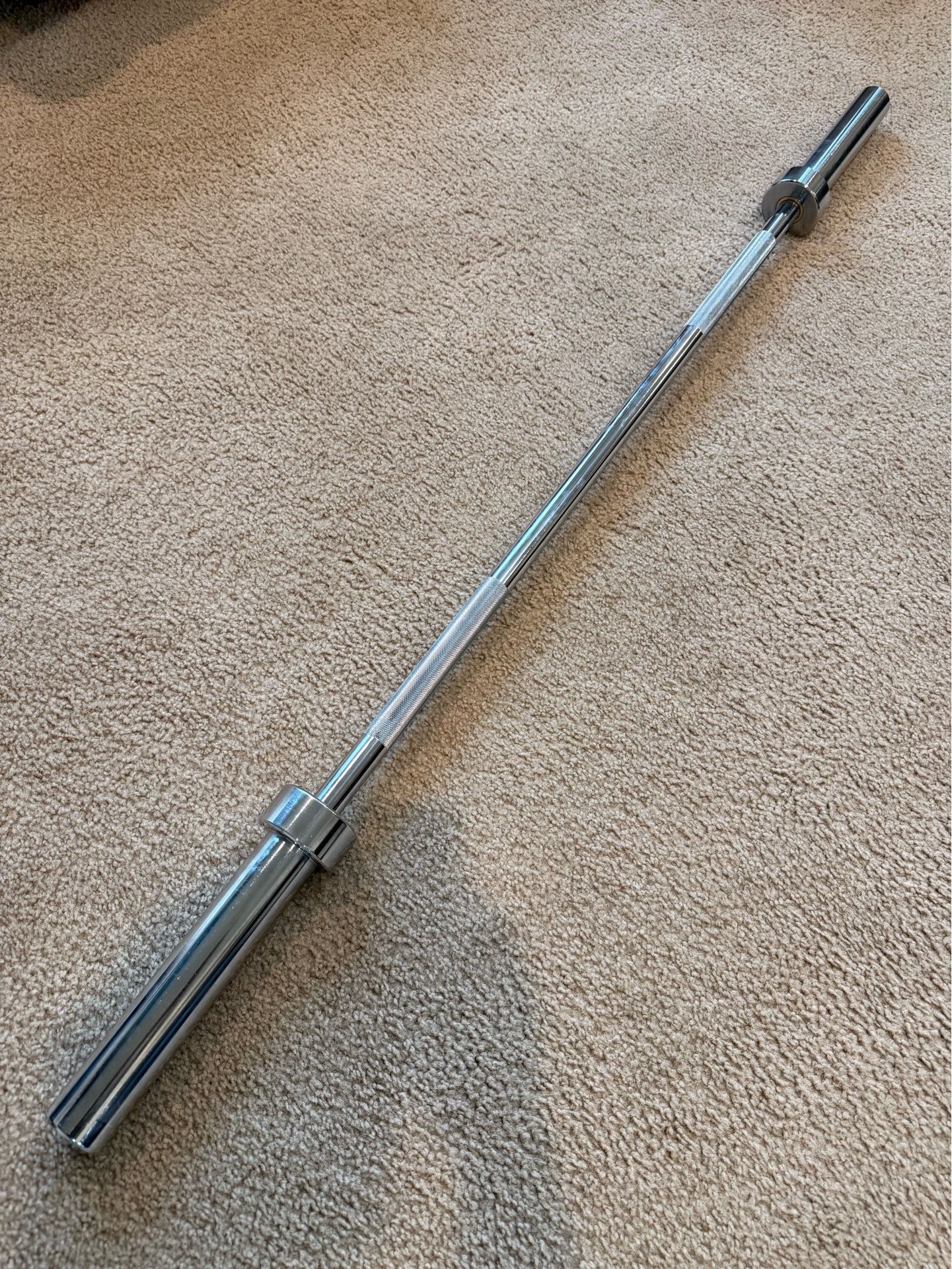 Brand new Titan fitness 5 foot Olympic barbell