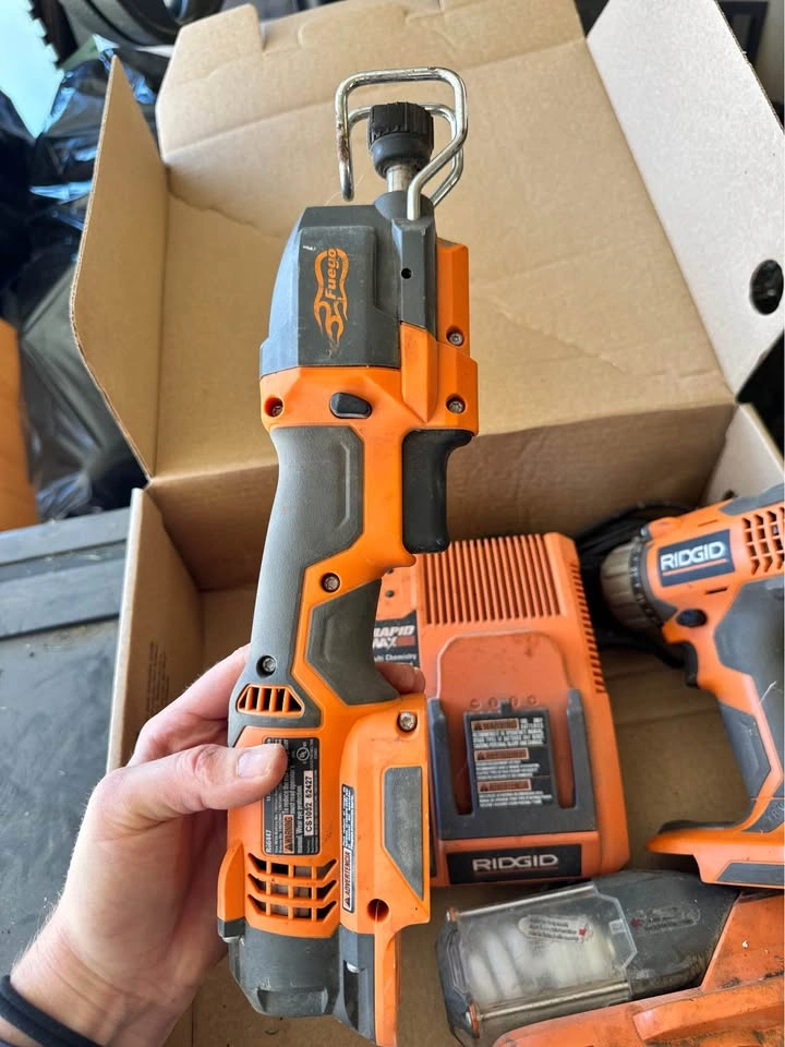 Assorted Ridgid Tools: Saw, Charger, Drill, and Work Light - photo 2