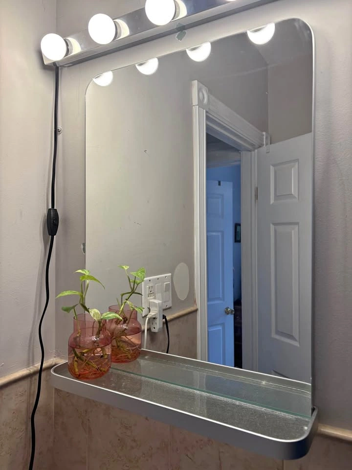 Mirror with shelf