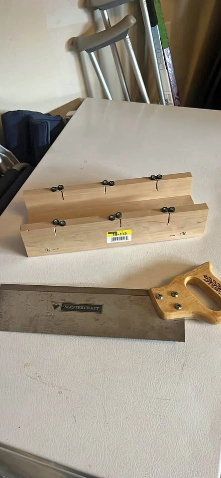 Mitre box and saw