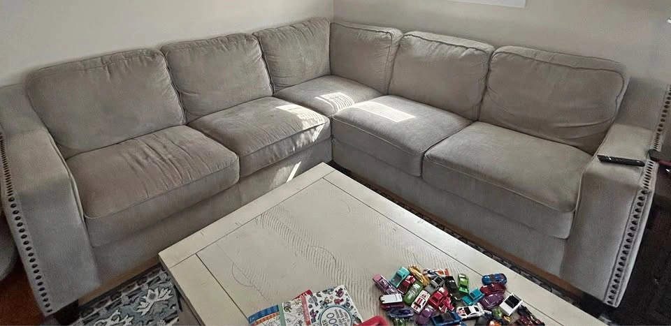 Light Gray Sectional Sofa with Nailhead Trim