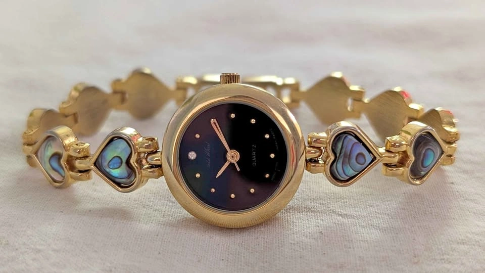 Gold Wheel Quartz Watch with Abalone Heart Links