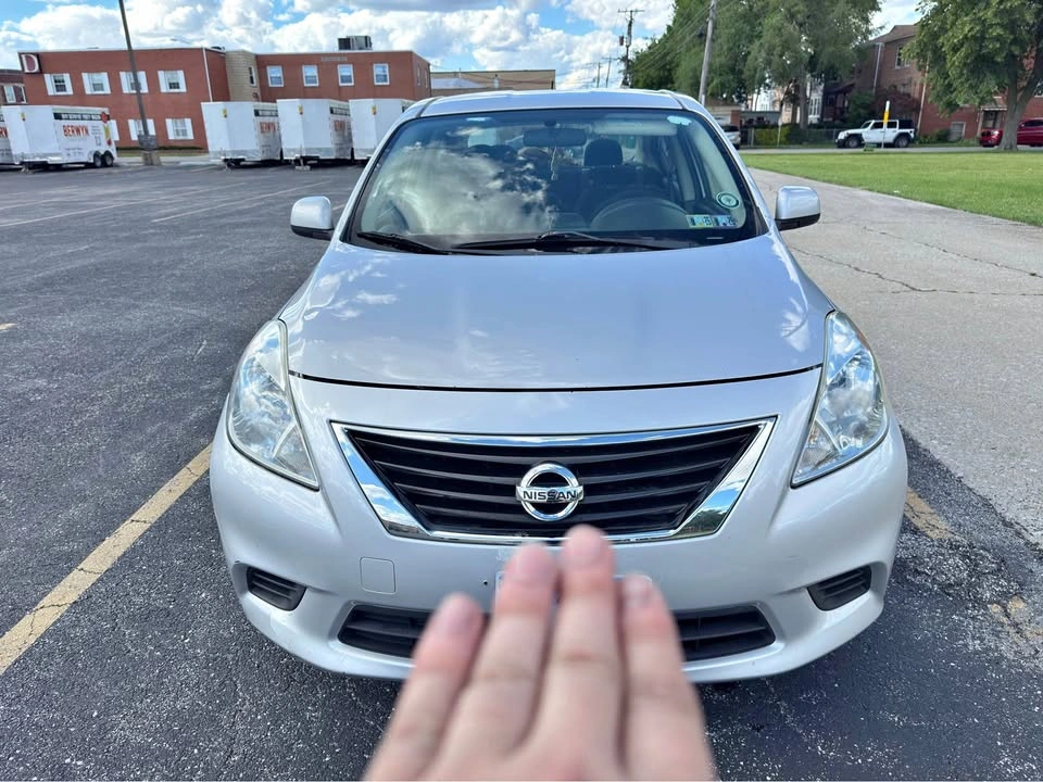 2014 Nissan Versa · SV Sedan 4D