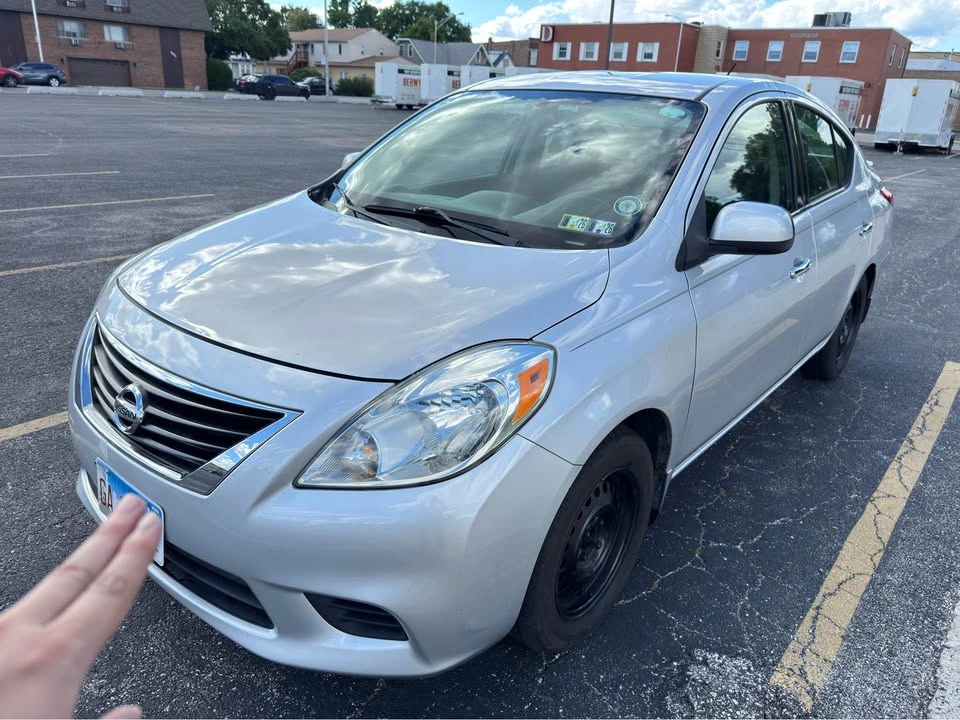 2014 Nissan Versa · SV Sedan 4D - photo 2
