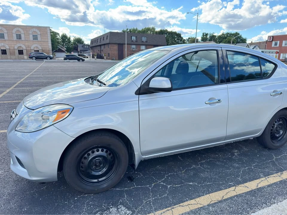 2014 Nissan Versa · SV Sedan 4D - photo 3