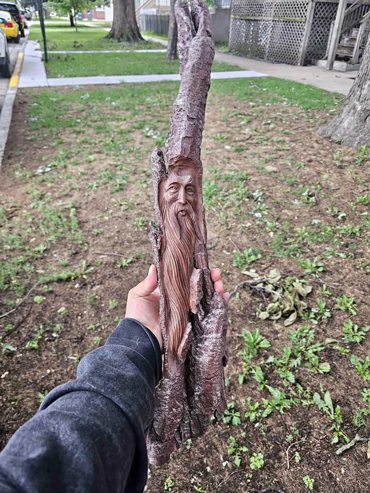 hand-carved wood spirit sculpture