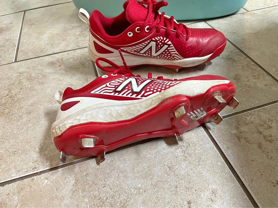 New balance metal cleats