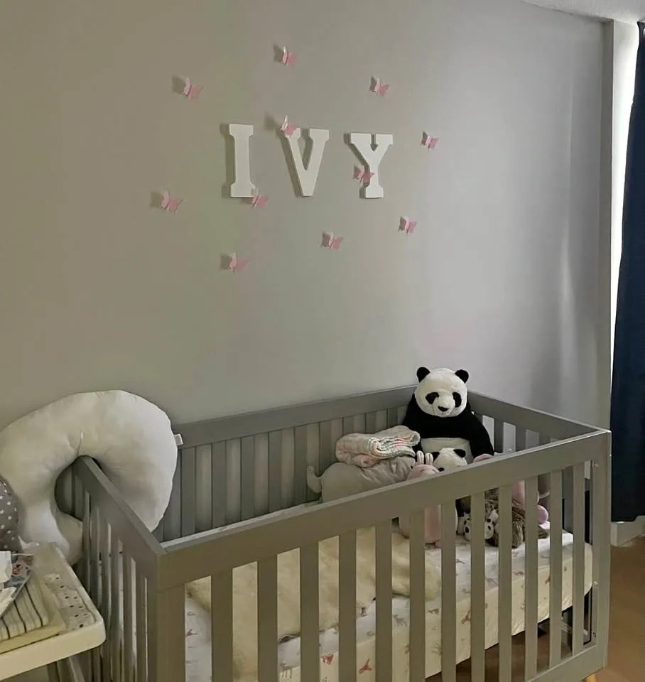 Grey baby crib
