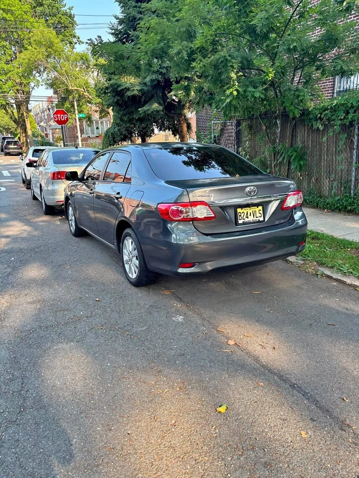 2011 Toyota Corolla · LE Sedan 4D