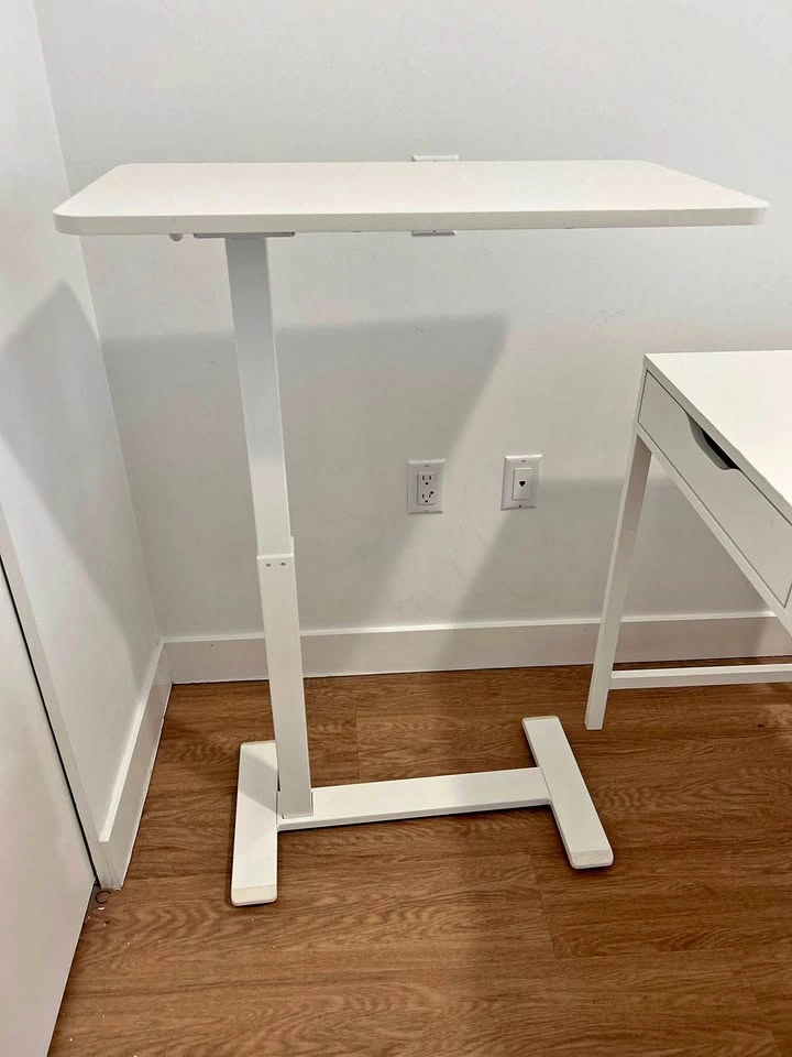 Ikea table with adjustable height and wheels