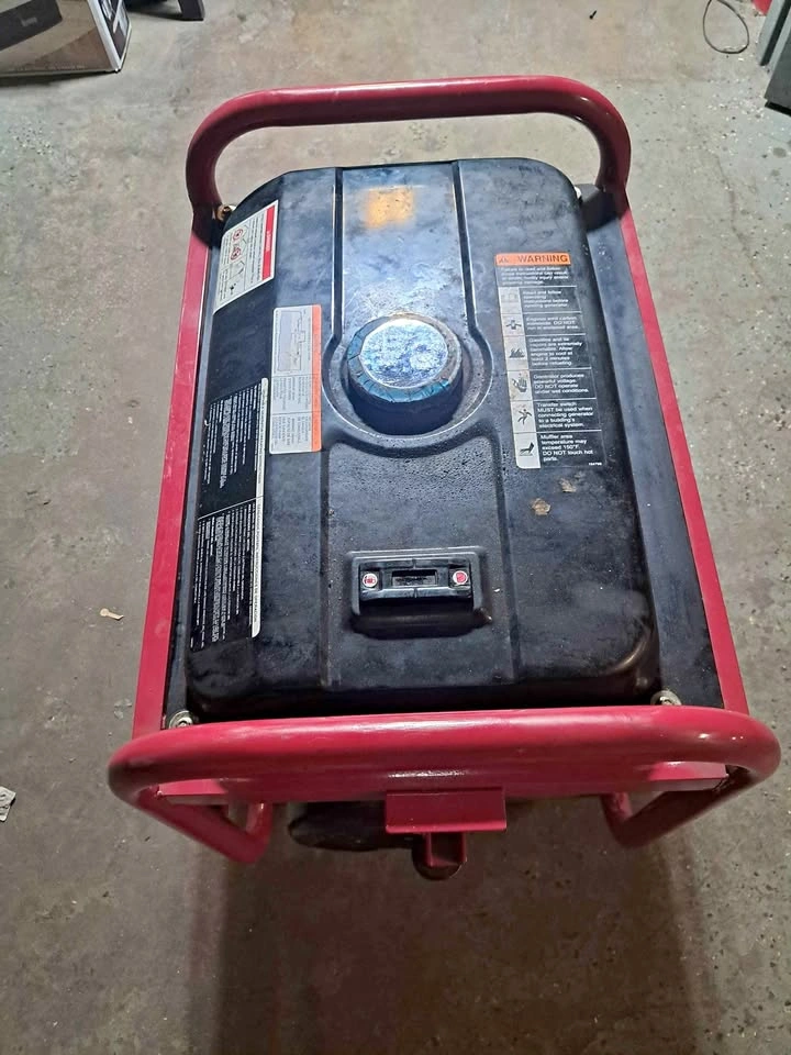 Husky portable generator with a capacity of 3750 watts.