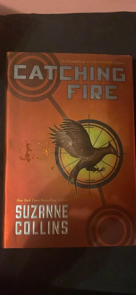 The hunger games trilogy hard cover book set - photo 3