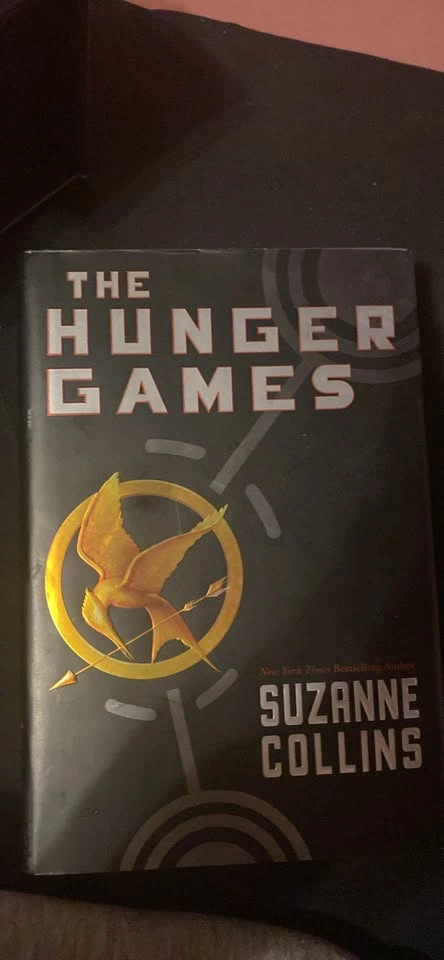 The hunger games trilogy hard cover book set - photo 4