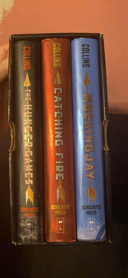 The hunger games trilogy hard cover book set - photo 5