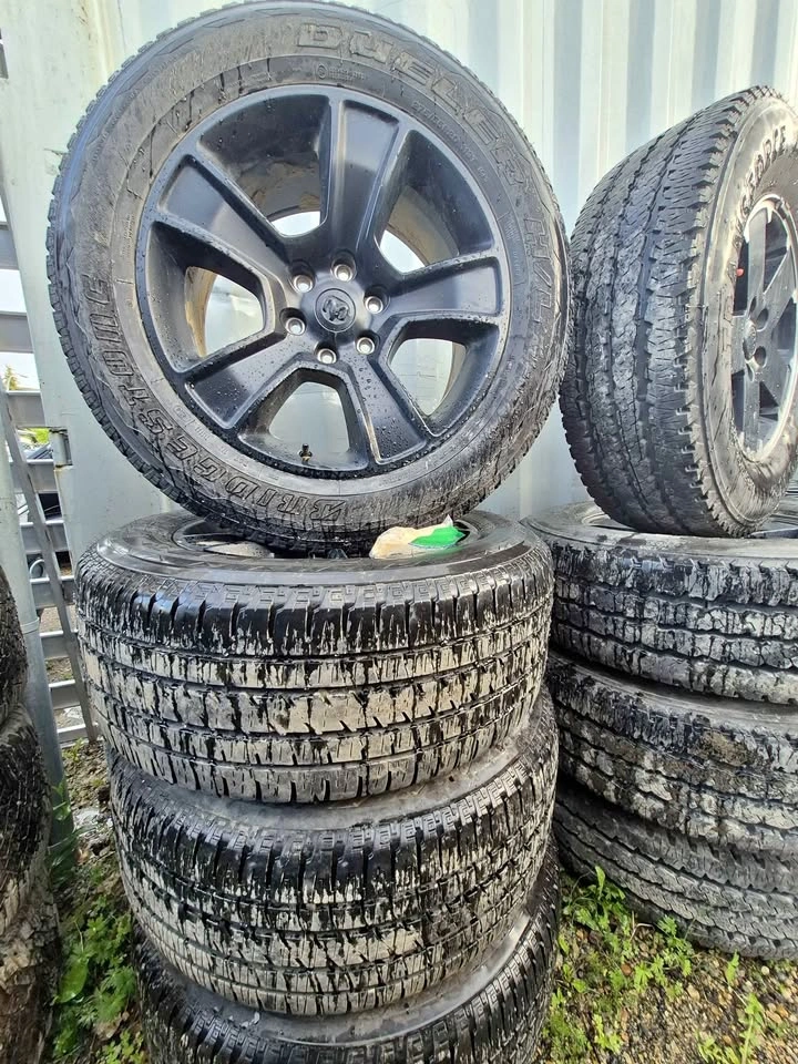 OEM Ram 1500 20" Black Wheels & Bridgestone Tires - 275/55R20