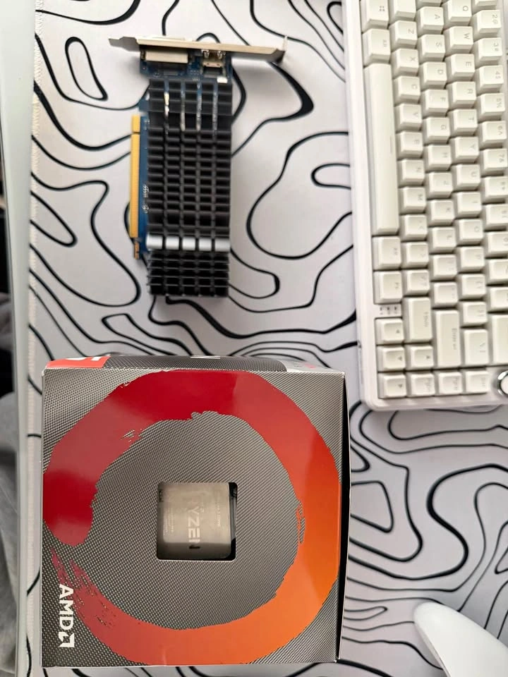 Ryzen 3 2200g with wraith cooler and GT 1030