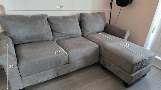 Grey Sectional Sofa with Reversible Chaise – Excellent Condition