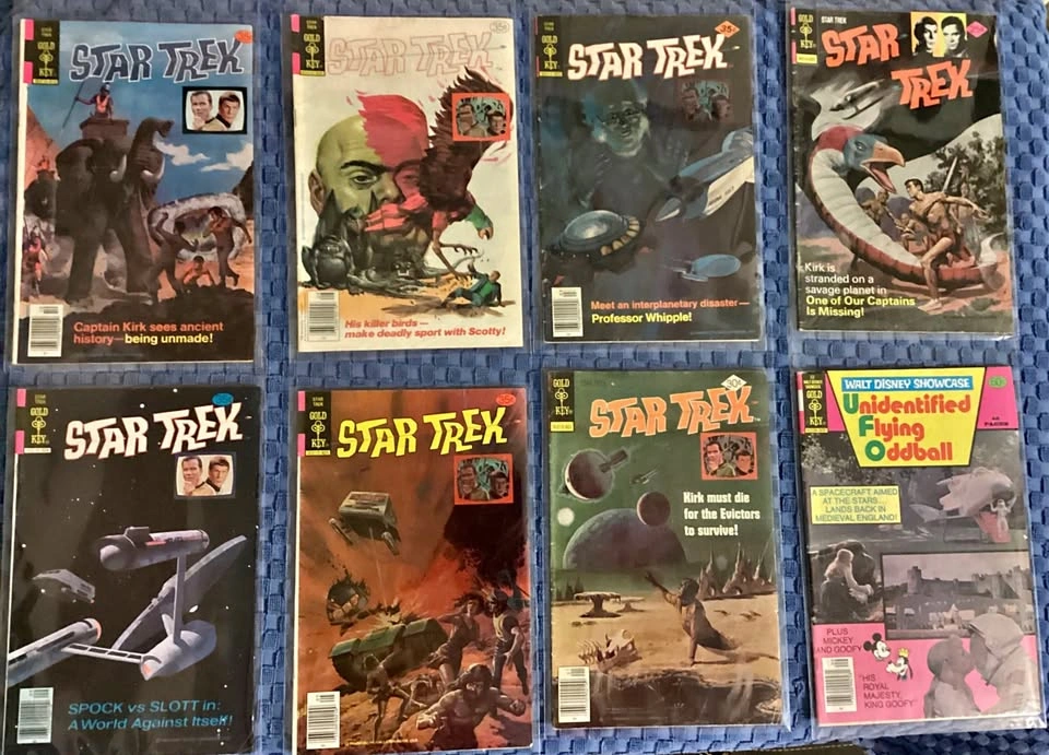 7 STAR TREK & 1 U.F.O Unidentified Flying Oddball Comics