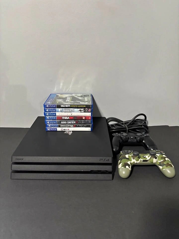 2TB PS4 Pro + 2 Controllers + 9 PS4 Games - $300!
