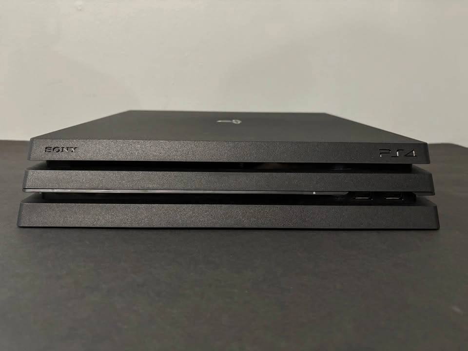 2TB PS4 Pro + 2 Controllers + 9 PS4 Games - $300! - photo 2