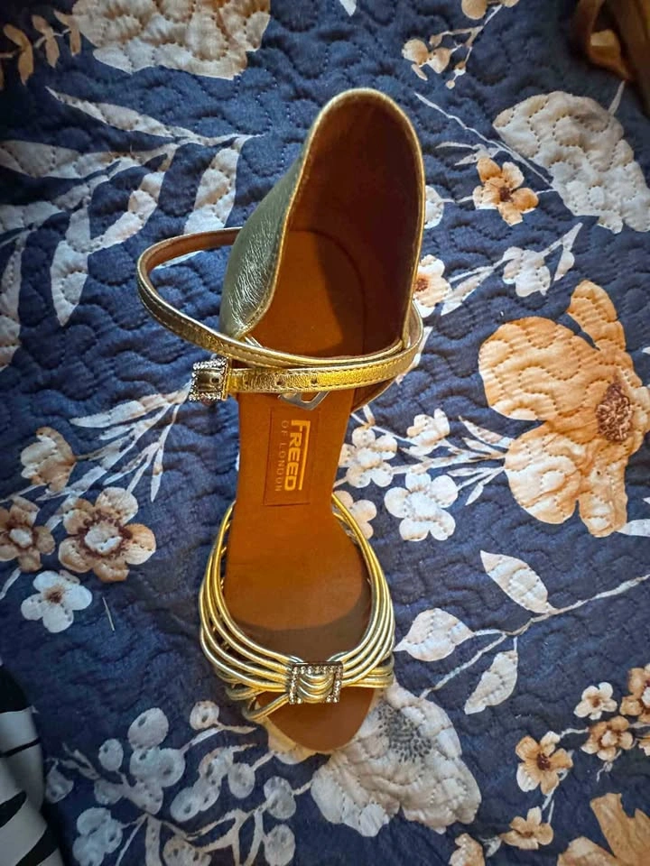 Freed of London Gold Heels (size 7)