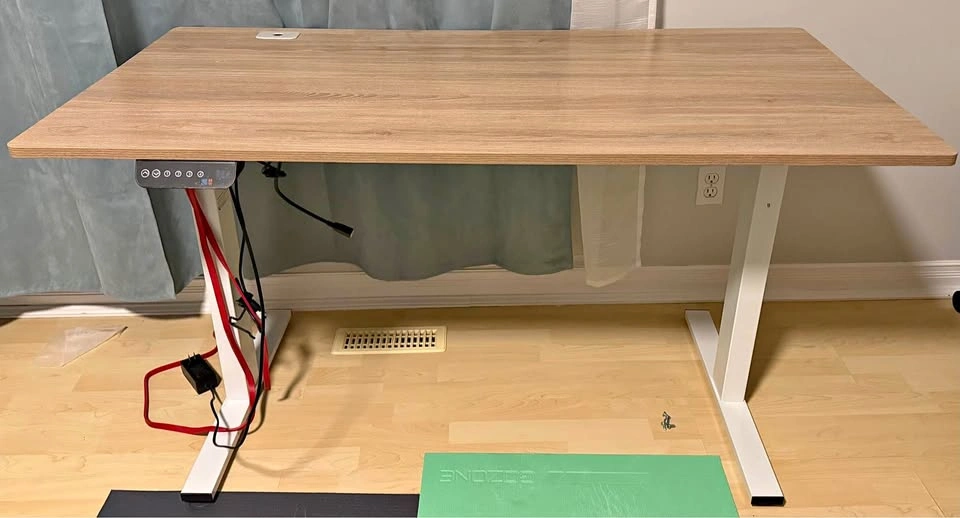 Electric standing computer desk