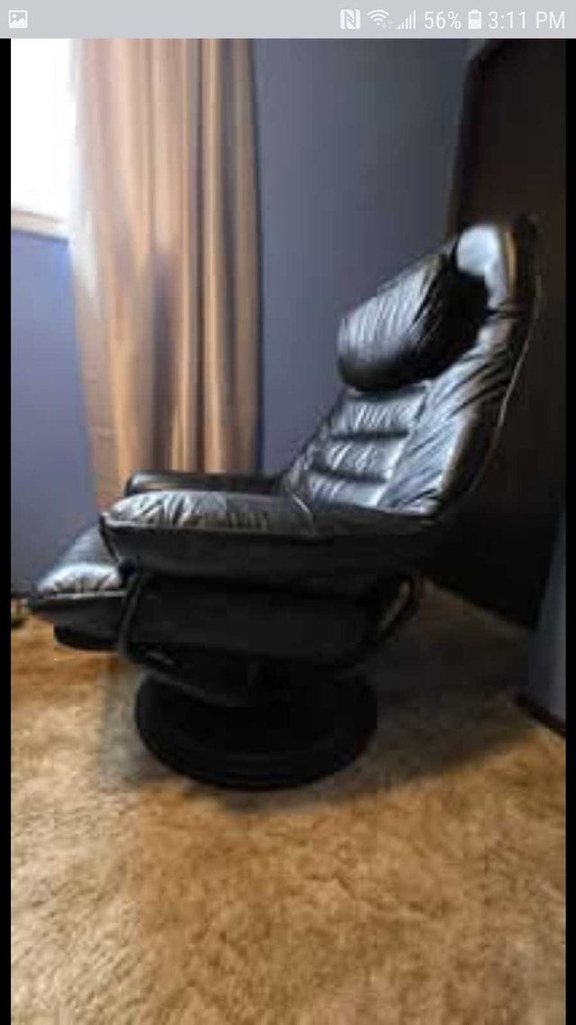 Black Leather Swivel Arm Chair